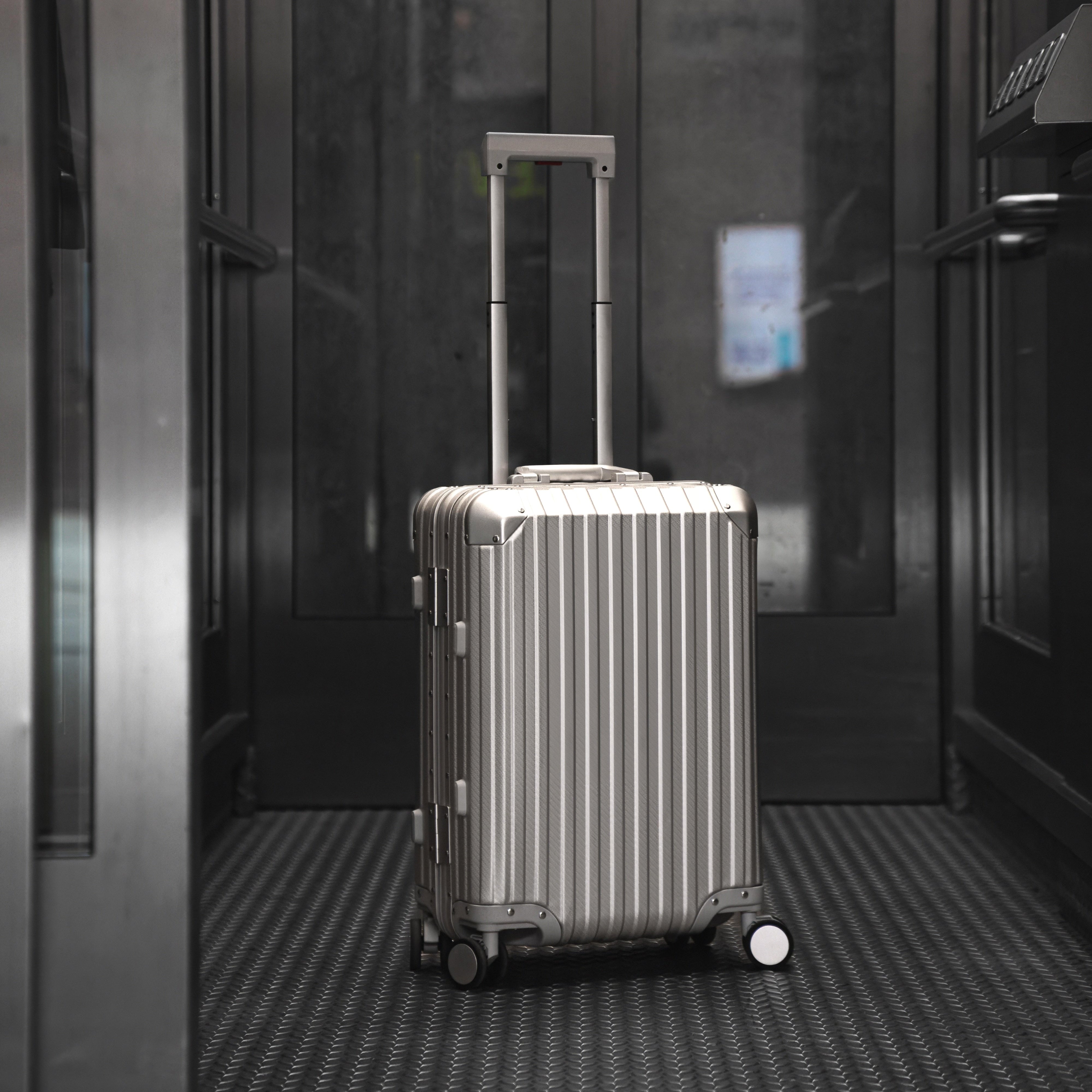 Argent Classic silver aluminium suitcase front view showing premium hard shell design and luxury travel finish