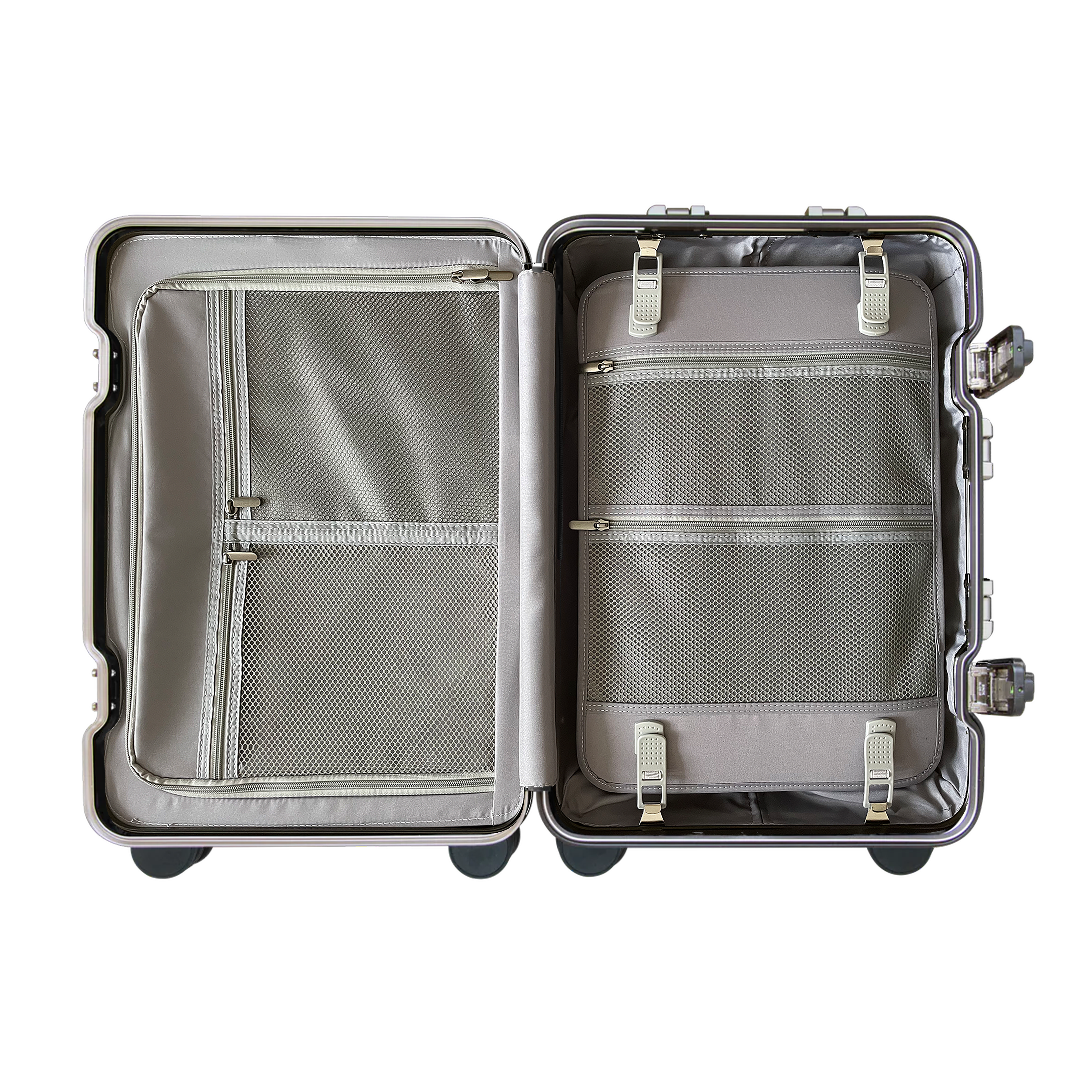 Champagne Lumiere aluminium suitcase open interior with organized compartments and compression straps for travel storage