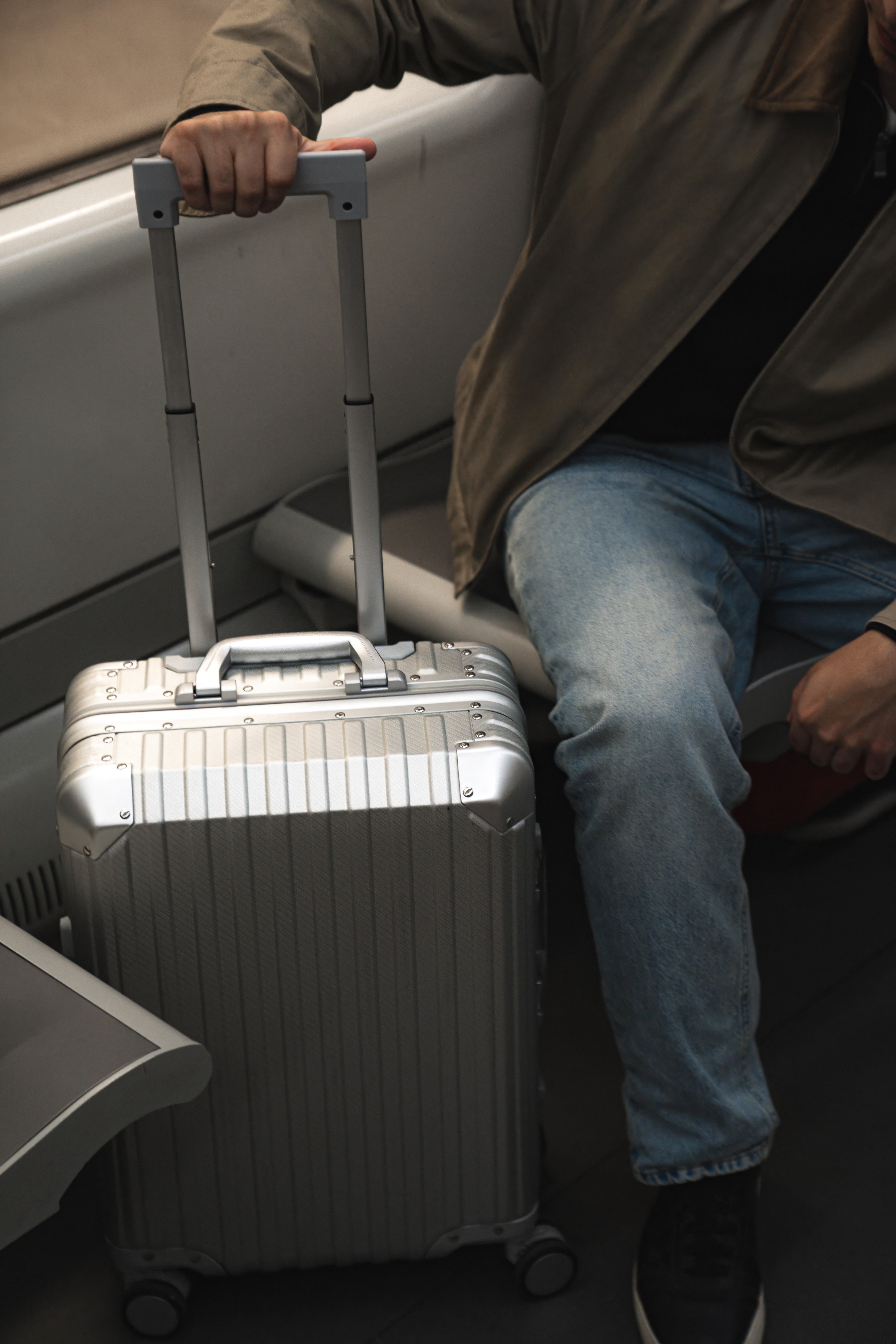 Minimalist luggage placed in contemporary travel environment