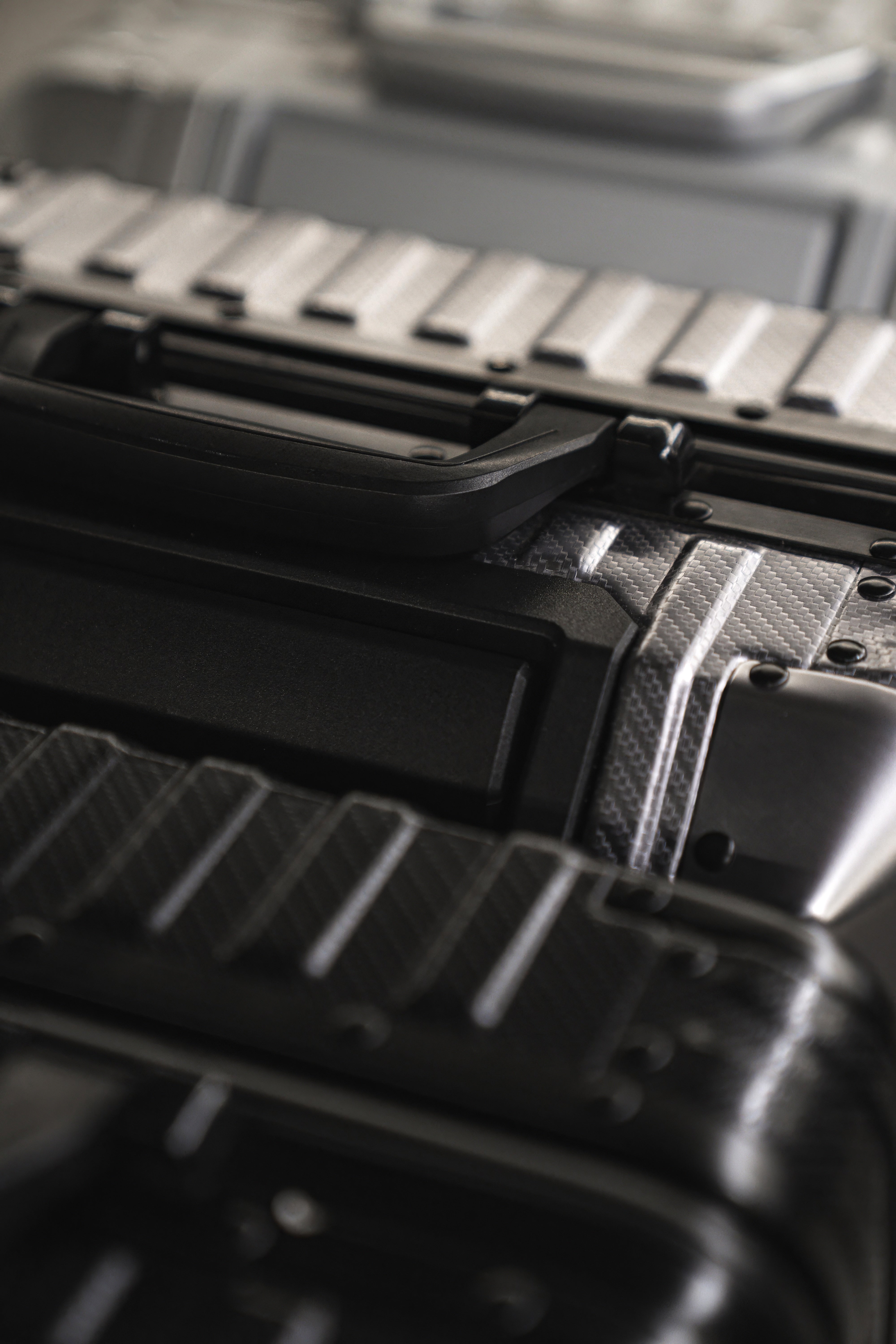 Close-up of aluminium texture on premium suitcase shell
