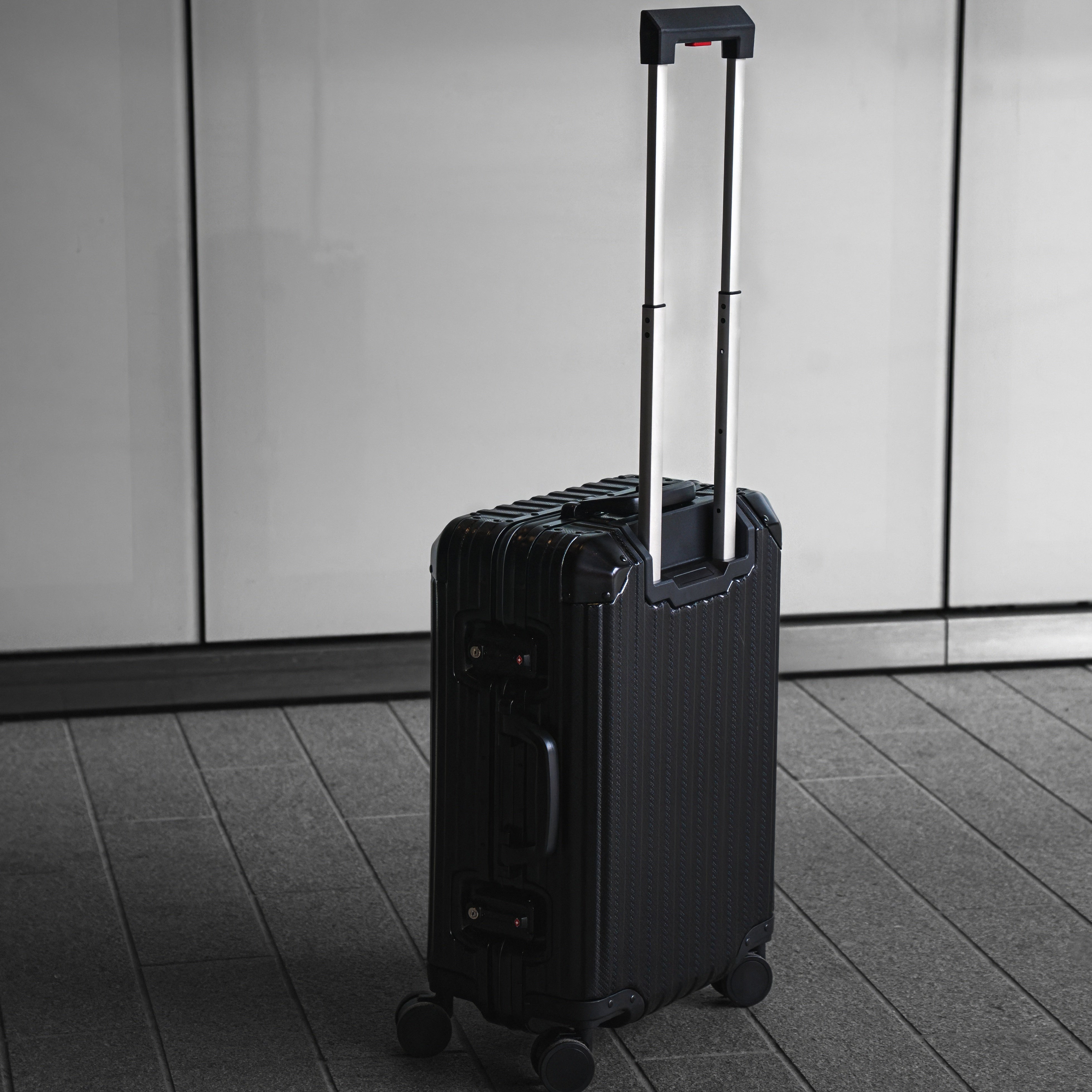 Noir Atelier Black aluminium suitcase view showing premium hard shell design and luxury travel finish